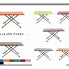 green blue orange brown table with 4 metal rod as support